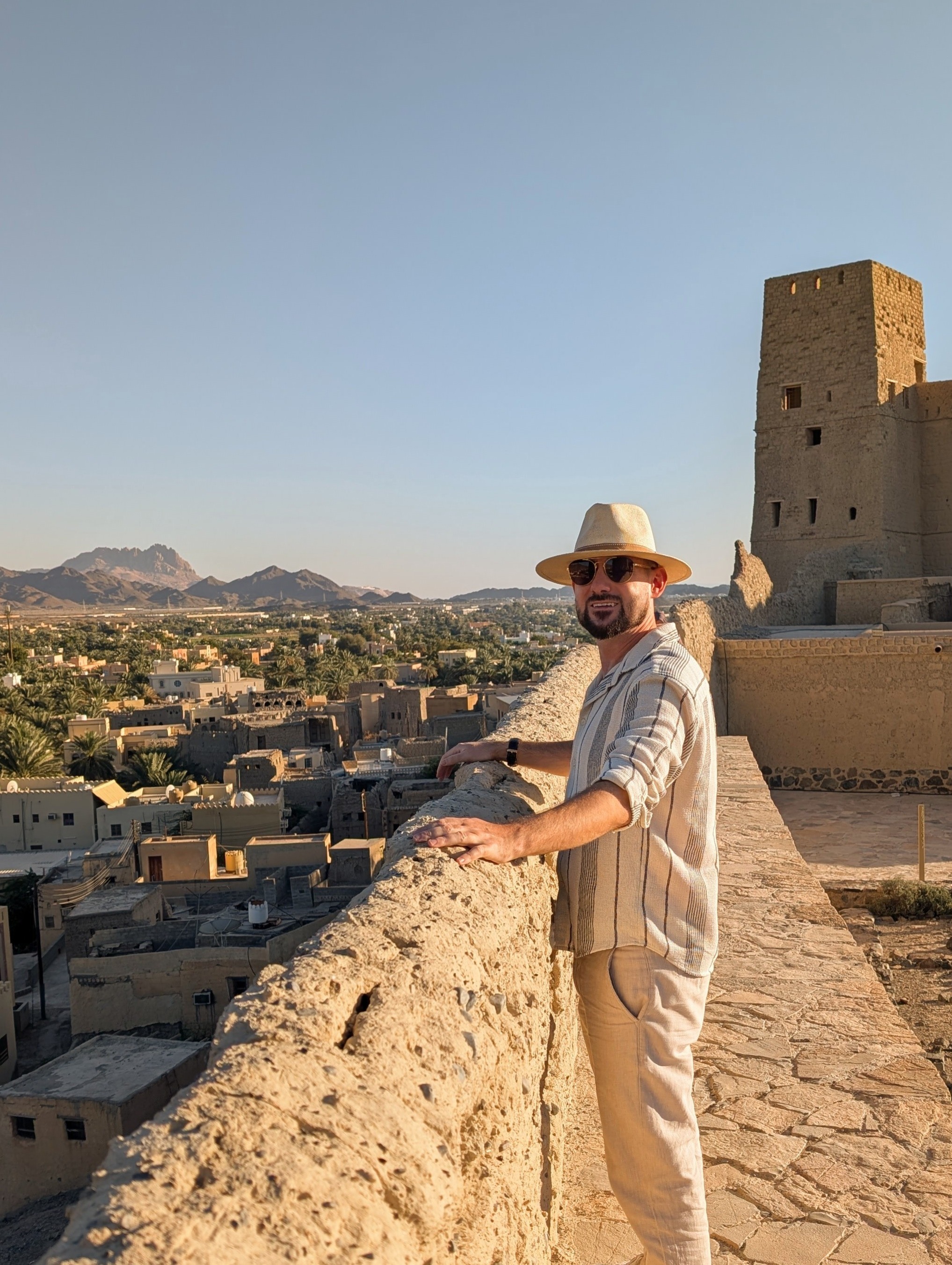 Standing on the walls of Bahla Fort in Oman